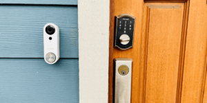 SimpliSafe Video Doorbell Pro on exterior of home with blue siding